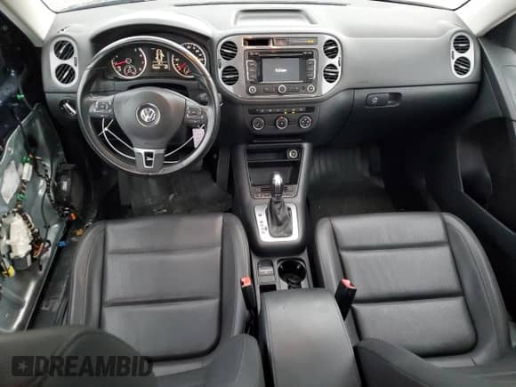 2013 Volkswagen Tiguan SE z VIN WVGAV3AX9DW056696, wystawiony jako Copart lot #54721695 z przebiegiem 108 656 mil mil oraz Szkoda całkowita • Salvage title. Historia ofert i sprzedaży dostępna na DreamBid. Obrazek 8.