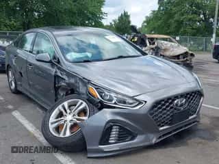 2019 Hyundai Sonata Sport z VIN 5NPE34AFXKH730981, wystawiony jako IAAI lot #42734945 z przebiegiem 92 362 mil mil oraz . Historia ofert i sprzedaży dostępna na DreamBid. Obrazek 1.