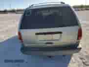 1999 Dodge Caravan z VIN 2B4GP25G7XR463634, wystawiony jako Copart lot #83890194 z przebiegiem Nie podano mil oraz Szkoda całkowita • Salvage title. Historia ofert i sprzedaży dostępna na DreamBid. Obrazek 6.