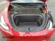 2023 Tesla Model Y Long Range z VIN 7SAYGDEE8PA113314, wystawiony jako Copart lot #80321355 z przebiegiem 15 710 mil mil oraz Szkoda całkowita • Salvage title. Historia ofert i sprzedaży dostępna na DreamBid. Obrazek 11.