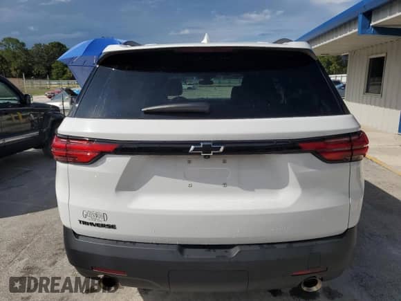 2023 Chevrolet Traverse LS with VIN 1GNERFKW2PJ309612, listed as a Copart auction lot 80000765 with 27,292 mi miles and Salvage title. Bid and sale history available at DreamBid. Image 6.