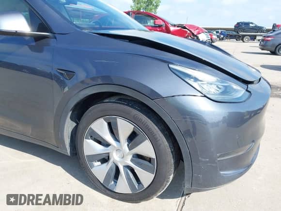 2022 Tesla Model Y Long Range z VIN 7SAYGAEE7NF389319, wystawiony jako IAAI lot #42492523 z przebiegiem Nie podano mil oraz . Historia ofert i sprzedaży dostępna na DreamBid. Obrazek 10.