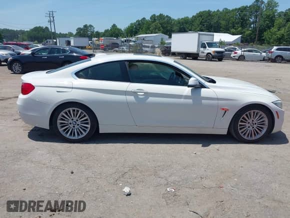 2014 BMW 4 Series 435i z VIN WBA3R1C52EF729201, wystawiony jako IAAI lot #42579604 z przebiegiem 145 277 mil mil oraz . Historia ofert i sprzedaży dostępna na DreamBid. Obrazek 13.