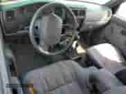 1997 Toyota Tacoma z VIN 4TAWN72N2VZ264266, wystawiony jako Copart lot #55149775 z przebiegiem 245 769 mil mil oraz Szkoda całkowita • Salvage title. Historia ofert i sprzedaży dostępna na DreamBid. Obrazek 8.