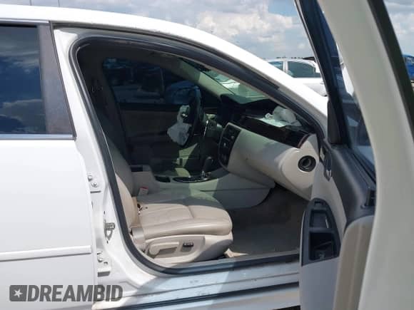 2012 Chevrolet Impala LTZ with VIN 2G1WC5E30C1138334, listed as a IAAI auction lot 43107686 with 193,149 mi miles and . Bid and sale history available at DreamBid. Image 5.