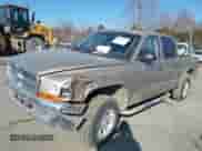 2002 Dodge Dakota with VIN 1B7HG48X92S713297, listed as a IAAI auction lot 40709139 with 271,904 mi miles and . Bid and sale history available at DreamBid. Image 2.