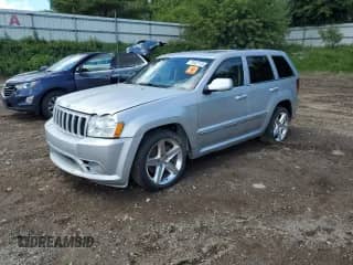 2007 Jeep Grand Cherokee SRT-8 with VIN 1J8HR78367C575284, listed as a Copart auction lot 71037115 with 148,372 mi miles and Clean title. Bid and sale history available at DreamBid. Image 1.