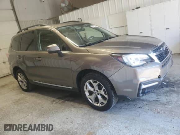 2017 Subaru Forester Touring with VIN JF2SJAWC9HH534402, listed as a Copart auction lot 68776805 with 77,362 mi miles and Salvage title. Bid and sale history available at DreamBid. Image 4.