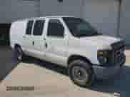 2014 Ford Econoline Cargo Commercial with VIN 1FTNE2EL5EDA27412, listed as a Copart auction lot 52173865 with 130,759 mi miles and Clean title. Bid and sale history available at DreamBid. Image 4.