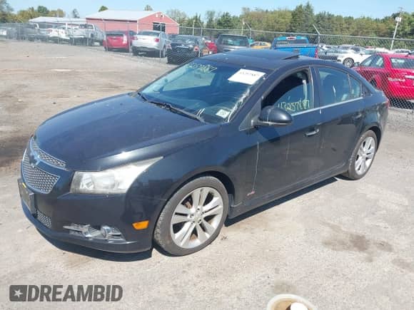 2012 Chevrolet Cruze LTZ с VIN 1G1PH5SC1C7135097, выставлен на аукционе IAAI как лот 43257887 с пробегом 129 445 миль миль и . История ставок и продаж доступна на DreamBid. Изображение 2.