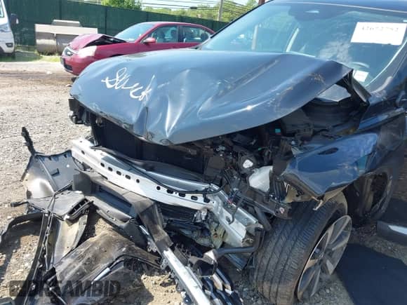 2024 Honda Pilot Touring with VIN 5FNYG1H77RB024994, listed as a IAAI auction lot 42672752 with 23,740 mi miles and . Bid and sale history available at DreamBid. Image 6.