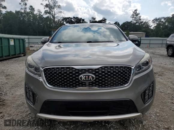 2016 Kia Sorento SXL с VIN 5XYPKDA18GG141684, выставлен на аукционе Copart как лот 69874325 с пробегом 137 160 миль миль и Списание • Salvage title. История ставок и продаж доступна на DreamBid. Изображение 5.