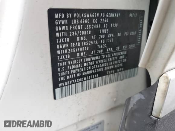 2013 Volkswagen Tiguan S z VIN WVGBV7AX0DW535519, wystawiony jako Copart lot #59439405 z przebiegiem 162 559 mil mil oraz Szkoda całkowita • Salvage title. Historia ofert i sprzedaży dostępna na DreamBid. Obrazek 13.