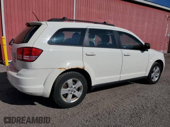 2015 Dodge Journey SE with VIN 3C4PDCAB3FT602617, listed as a Copart auction lot 81873125 with 243,830 mi miles and Clean title. Bid and sale history available at DreamBid. Image 3.