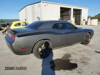 2012 Dodge Challenger SXT Plus с VIN 2C3CDYAG1CH189385, выставлен на аукционе Copart как лот 82636565 с пробегом 198 141 миль миль и Чистый • Clean title. История ставок и продаж доступна на DreamBid. Изображение 3.