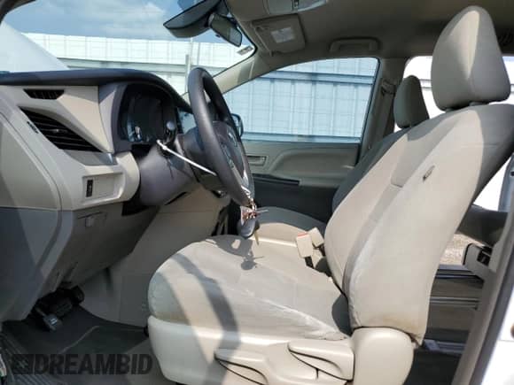 2019 Toyota Sienna L with VIN 5TDZZ3DC4KS008203, listed as a Copart auction lot 54883715 with 70,867 mi miles and Salvage title. Bid and sale history available at DreamBid. Image 7.