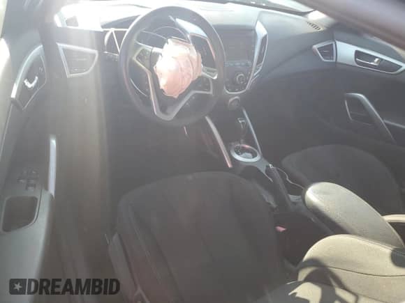 2012 Hyundai Veloster w/Black Int z VIN KMHTC6AD7CU028864, wystawiony jako Copart lot #66377895 z przebiegiem 130 440 mil mil oraz Szkoda całkowita • Salvage title. Historia ofert i sprzedaży dostępna na DreamBid. Obrazek 8.