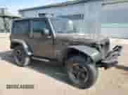 2018 Jeep Wrangler Sport with VIN 1C4AJWAGXJL897599, listed as a Copart auction lot 60906105 with Not provided miles and Clean title. Bid and sale history available at DreamBid. Image 4.