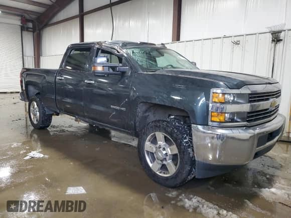 2017 Chevrolet Silverado 2500HD Work Truck with VIN 1GC1KUEG9HF134056, listed as a Copart auction lot 41985655 with 119,199 mi miles and Salvage title. Bid and sale history available at DreamBid. Image 4.