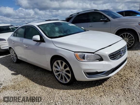 2018 Volvo S60 Inscription Platinum с VIN LYV402HM6JB172770, выставлен на аукционе Copart как лот 76245474 с пробегом Не указан миль и На запчасти • Non repairable. История ставок и продаж доступна на DreamBid. Изображение 4.