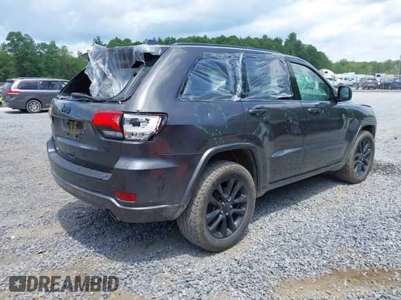 2020 Jeep Grand Cherokee Laredo E with VIN 1C4RJFAG3LC222232, listed as a IAAI auction lot 42636691 with 94,553 mi miles and . Bid and sale history available at DreamBid. Image 4.