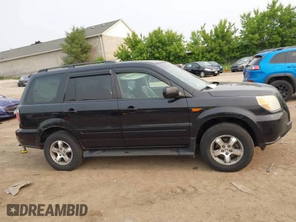 2006 Honda Pilot EX-L z VIN 5FNYF186X6B019441, wystawiony jako IAAI lot #42313053 z przebiegiem 307 012 mil mil oraz . Historia ofert i sprzedaży dostępna na DreamBid. Obrazek 13.