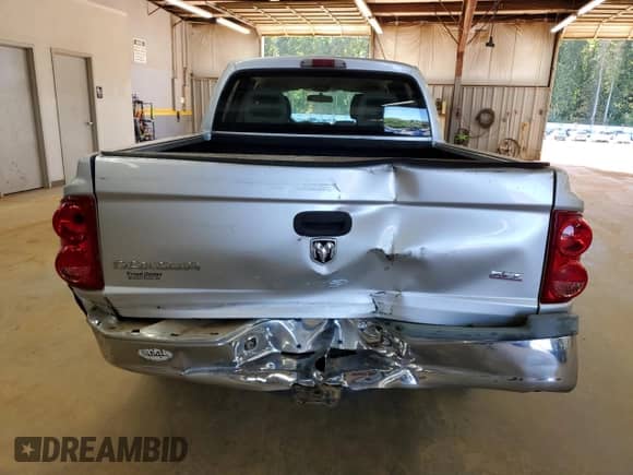 2005 Dodge Dakota SLT with VIN 1D7HW48N85S306003, listed as a Copart auction lot 86598565 with 346,174 mi miles and Salvage title. Bid and sale history available at DreamBid. Image 6.