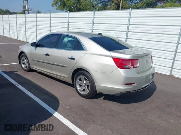 2013 Chevrolet Malibu LS with VIN 1G11B5SA1DF319128, listed as a IAAI auction lot 43221704 with 199,125 mi miles and . Bid and sale history available at DreamBid. Image 3.