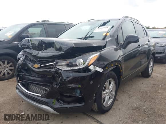 2021 Chevrolet Trax LT z VIN KL7CJLSBXMB306785, wystawiony jako IAAI lot #43415505 z przebiegiem 38 274 mil mil oraz . Historia ofert i sprzedaży dostępna na DreamBid. Obrazek 2.