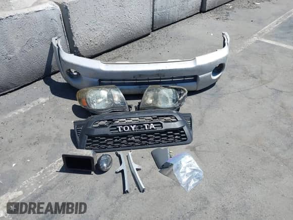 2005 Toyota Tacoma PreRunner with VIN 5TEKU72N65Z053095, listed as a IAAI auction lot 43017798 with 283,534 mi miles and . Bid and sale history available at DreamBid. Image 12.