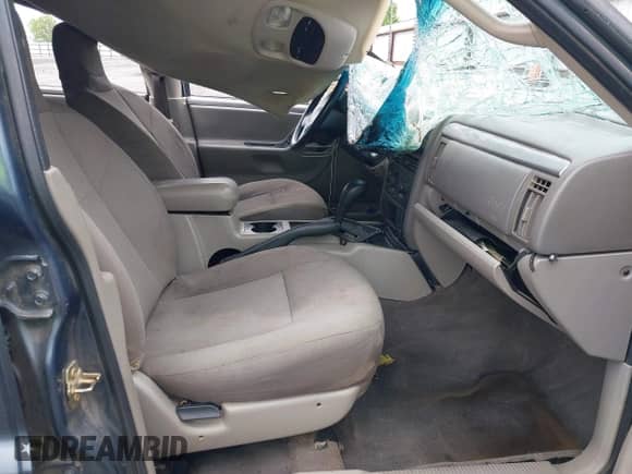 2004 Jeep Grand Cherokee Laredo with VIN 1J4GX48S34C213420, listed as a IAAI auction lot 42221769 with 194,163 mi miles and . Bid and sale history available at DreamBid. Image 5.