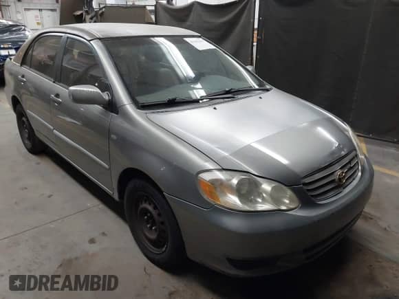 2004 Toyota Corolla CE with VIN JTDBR32E342029415, listed as a IAAI auction lot 43165463 with 210,597 mi miles and . Bid and sale history available at DreamBid. Image 1.
