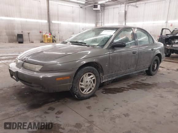 1998 Saturn SL with VIN 1G8ZH528XWZ240574, listed as a IAAI auction lot 41588681 with Not provided miles and . Bid and sale history available at DreamBid. Image 2.