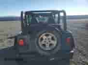 1999 Jeep Wrangler Sport with VIN 1J4FY19S1XP455674, listed as a Copart auction lot 86821605 with 218,356 mi miles and Clean title. Bid and sale history available at DreamBid. Image 6.