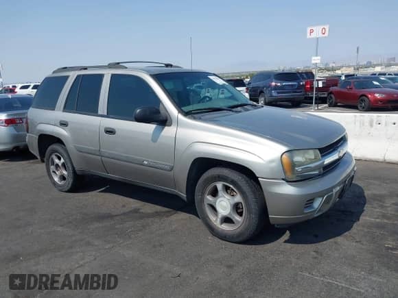 2003 Chevrolet TrailBlazer LT with VIN 1GNDS13S332297960, listed as a IAAI auction lot 42754802 with 216,615 mi miles and . Bid and sale history available at DreamBid. Image 1.