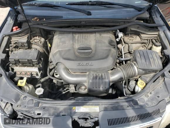 2011 Jeep Grand Cherokee Laredo with VIN 1J4RS4GG0BC658098, listed as a Copart auction lot 84580365 with 212,377 mi miles and Salvage title. Bid and sale history available at DreamBid. Image 12.