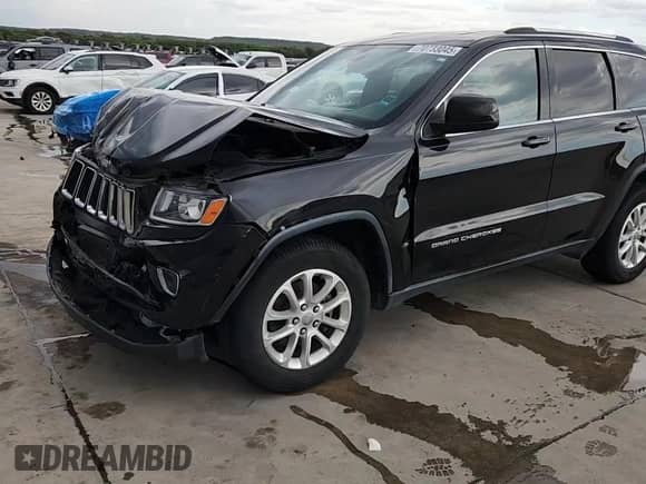 2014 Jeep Grand Cherokee Laredo с VIN 1C4RJEAGXEC145629, выставлен на аукционе Copart как лот 70733045 с пробегом 125 145 миль миль и Списание • Salvage title. История ставок и продаж доступна на DreamBid. Изображение 14.