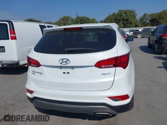 2018 Hyundai Santa Fe 2.4L with VIN 5XYZT3LB3JG519293, listed as a IAAI auction lot 43243050 with 97,903 mi miles and . Bid and sale history available at DreamBid. Image 16.