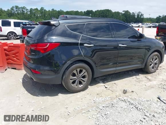2015 Hyundai Santa Fe с VIN 5XYZU3LB2FG245007, выставлен на аукционе IAAI как лот 42912026 с пробегом 54 476 миль миль и . История ставок и продаж доступна на DreamBid. Изображение 4.
