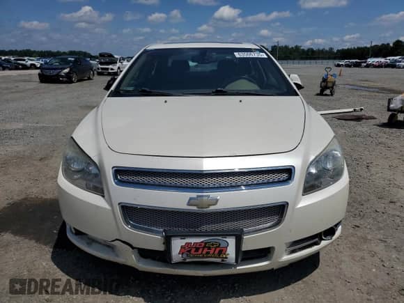 2010 Chevrolet Malibu LTZ with VIN 1G1ZE5E74AF325107, listed as a Copart auction lot 63506735 with 144,876 mi miles and Salvage title. Bid and sale history available at DreamBid. Image 5.