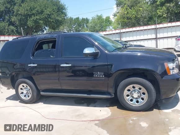2014 Chevrolet Tahoe LS with VIN 1GNSCAE0XER219038, listed as a IAAI auction lot 42284768 with 82,037 mi miles and . Bid and sale history available at DreamBid. Image 14.