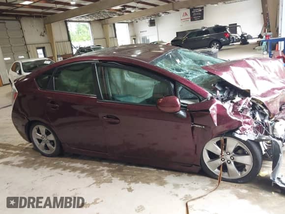 2013 Toyota Prius One z VIN JTDKN3DU9D5584318, wystawiony jako IAAI lot #42246950 z przebiegiem Nie podano mil oraz . Historia ofert i sprzedaży dostępna na DreamBid. Obrazek 14.