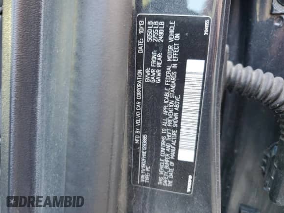 2014 Volvo S60 T6 with VIN YV1902FHXE1293885, listed as a Copart auction lot 61904664 with 105,151 mi miles and Salvage title. Bid and sale history available at DreamBid. Image 12.