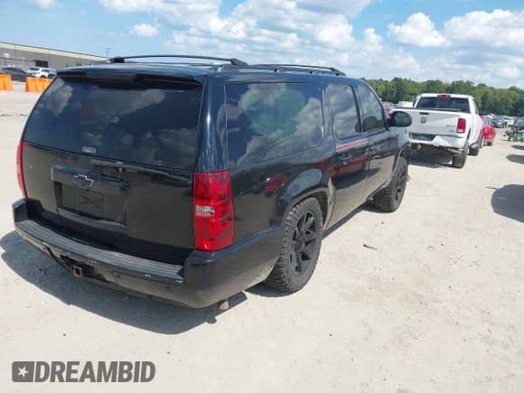 2009 Chevrolet Suburban LTZ z VIN 1GNFK36329R145158, wystawiony jako IAAI lot #43141956 z przebiegiem 336 452 mil mil oraz . Historia ofert i sprzedaży dostępna na DreamBid. Obrazek 4.