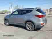 2018 Hyundai Santa Fe 2.4L z VIN 5NMZU3LB2JH101312, wystawiony jako Copart lot #80027115 z przebiegiem 101 482 mil mil oraz Szkoda całkowita • Salvage title. Historia ofert i sprzedaży dostępna na DreamBid. Obrazek 2.