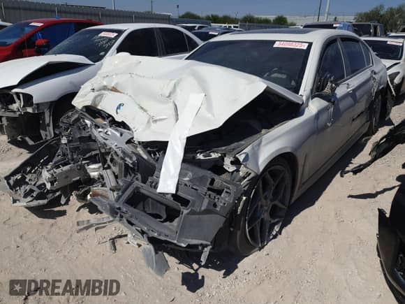 2020 BMW 7 Series 740i with VIN WBA7T2C09LCD15735, listed as a Copart auction lot 54098325 with Not provided miles and Salvage title. Bid and sale history available at DreamBid. Image 1.