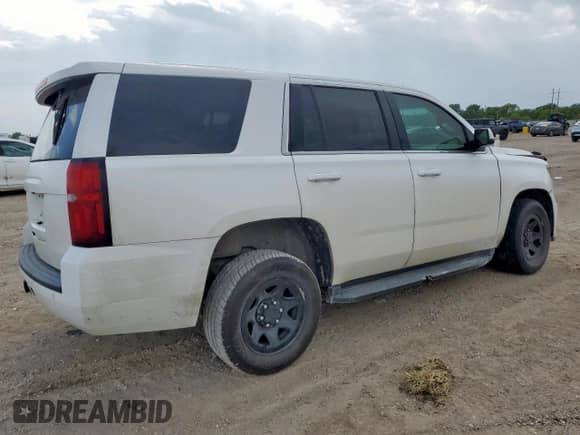 2015 Chevrolet Tahoe Commercial с VIN 1GNLC2EC0FR562690, выставлен на аукционе Copart как лот 63842085 с пробегом 182 732 миль миль и Списание • Salvage title. История ставок и продаж доступна на DreamBid. Изображение 3.