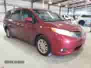 2015 Toyota Sienna XLE with VIN 5TDYK3DC8FS669402, listed as a Copart auction lot 71993775 with 187,428 mi miles and Salvage title. Bid and sale history available at DreamBid. Image 4.