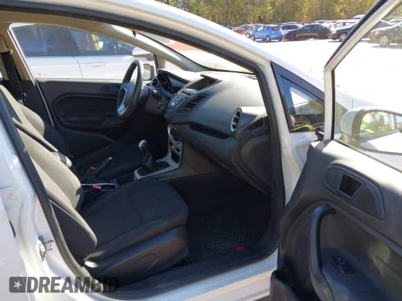 2017 Ford Fiesta SE z VIN 3FADP4BE4HM143139, wystawiony jako IAAI lot #43506063 z przebiegiem 152 151 mil mil oraz . Historia ofert i sprzedaży dostępna na DreamBid. Obrazek 5.