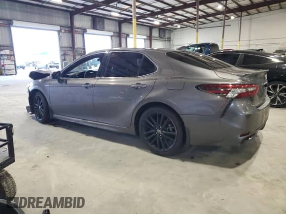 2023 Toyota Camry Hybrid XSE с VIN 4T1K31AK7PU608103, выставлен на аукционе Copart как лот 71901105 с пробегом 65 154 миль миль и Списание • Salvage title. История ставок и продаж доступна на DreamBid. Изображение 2.